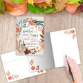 Load image into Gallery viewer, The inside of Tree-Free’s Grateful and Happy card, with the cover and envelope in the background.