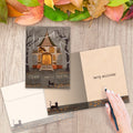 Load image into Gallery viewer, The inside of Tree-Free’s Haunted House Halloween Card card, with the cover and envelope in the background.