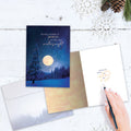 Load image into Gallery viewer, The inside of Tree-Free’s Peace In Winters Night Solstice Card card, with the cover and envelope in the background.
