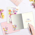 Load image into Gallery viewer, The inside of Tree-Free’s Who I Am card, with the cover and envelope in the background.