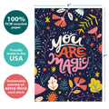 Load image into Gallery viewer, The cover of Tree-Free’s You Are Magic card with lines demonstrating its 5x7 dimensions, along with the following text: “100% PCW recycled paper, proudly made in the USA, sustainably printed on extra-thick card stock”
