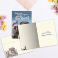Load image into Gallery viewer, The inside of Tree-Free’s Dog Years card, with the cover and envelope in the background.