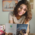 Load image into Gallery viewer, Lifestyle image(s) featuring Tree-Free’s Dog Years card