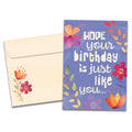 Load image into Gallery viewer, Cover of The Best Birthday card (featuring script and serif text surrounded by artwork of flowers) and its matching envelope