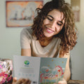 Load image into Gallery viewer, Lifestyle image(s) featuring Tree-Free’s Magical Floral Unicorn card