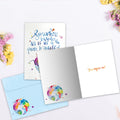 Load image into Gallery viewer, The inside of Tree-Free’s Change The World card, with the cover and envelope in the background.