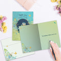 Load image into Gallery viewer, The inside of Tree-Free’s Bird Kindness card, with the cover and envelope in the background.