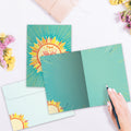 Load image into Gallery viewer, The inside of Tree-Free’s Happy Difference card, with the cover and envelope in the background.