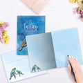 Load image into Gallery viewer, The inside of Tree-Free’s Turtley Awesome card, with the cover and envelope in the background.