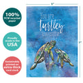 Load image into Gallery viewer, The cover of Tree-Free’s Turtley Awesome card with lines demonstrating its 5x7 dimensions, along with the following text: “100% PCW recycled paper, proudly made in the USA, sustainably printed on extra-thick card stock”