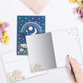 Load image into Gallery viewer, The inside of Tree-Free’s Magical Sky card, with the cover and envelope in the background.
