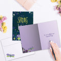 Load image into Gallery viewer, The inside of Tree-Free’s Strong and Brave card, with the cover and envelope in the background.