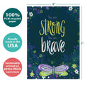 Load image into Gallery viewer, The cover of Tree-Free’s Strong and Brave card with lines demonstrating its 5x7 dimensions, along with the following text: “100% PCW recycled paper, proudly made in the USA, sustainably printed on extra-thick card stock”