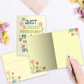Load image into Gallery viewer, The inside of Tree-Free’s Little Reminder card, with the cover and envelope in the background.