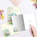 Load image into Gallery viewer, The inside of Tree-Free’s Full Of Love card, with the cover and envelope in the background.