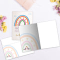 Load image into Gallery viewer, The inside of Tree-Free’s Love Rainbow card, with the cover and envelope in the background.