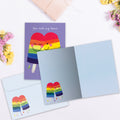 Load image into Gallery viewer, The inside of Tree-Free’s Rainbow Popsicles card, with the cover and envelope in the background.