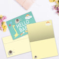 Load image into Gallery viewer, The inside of Tree-Free’s Hello Baby card, with the cover and envelope in the background.