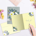 Load image into Gallery viewer, The inside of Tree-Free’s Floral Bouquet card, with the cover and envelope in the background.