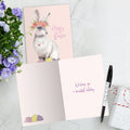 Load image into Gallery viewer, The inside of Tree-Free’s Pretty Hoppy Bunny card, with the cover and envelope in the background.