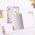 Load image into Gallery viewer, The inside of Tree-Free’s Grateful Heart Floral card, with the cover and envelope in the background.