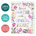 Load image into Gallery viewer, The cover of Tree-Free’s Grateful Heart Floral card with lines demonstrating its 5x7 dimensions, along with the following text: “100% PCW recycled paper, proudly made in the USA, sustainably printed on extra-thick card stock”