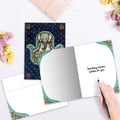 Load image into Gallery viewer, The inside of Tree-Free’s Meditating Elephant card, with the cover and envelope in the background.