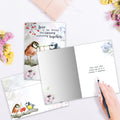 Load image into Gallery viewer, The inside of Tree-Free’s Threads of Love card, with the cover and envelope in the background.