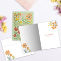 Load image into Gallery viewer, The inside of Tree-Free’s Precious Blooms card, with the cover and envelope in the background.