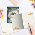 Load image into Gallery viewer, The inside of Tree-Free’s Not All Who Wander card, with the cover and envelope in the background.