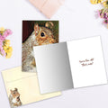 Load image into Gallery viewer, The inside of Tree-Free’s Nuts Squirrel card, with the cover and envelope in the background.