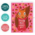 Load image into Gallery viewer, The cover of Tree-Free’s Squirrel Nuts card with lines demonstrating its 5x7 dimensions, along with the following text: “100% PCW recycled paper, proudly made in the USA, sustainably printed on extra-thick card stock”