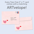 Load image into Gallery viewer, The envelope for Tree-Free’s Happy Hearts card, along with the following text: “Every Tree-Free 5x7 card comes with a matching ARTvelope!”