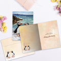 Load image into Gallery viewer, The inside of Tree-Free’s Puffin Marriage card, with the cover and envelope in the background.