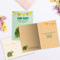 Load image into Gallery viewer, The inside of Tree-Free’s Turtle Butt Fun Fact card, with the cover and envelope in the background.