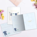 Load image into Gallery viewer, The inside of Tree-Free’s New Baby Boy card, with the cover and envelope in the background.