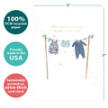 Load image into Gallery viewer, The cover of Tree-Free’s New Baby Boy card with lines demonstrating its 5x7 dimensions, along with the following text: “100% PCW recycled paper, proudly made in the USA, sustainably printed on extra-thick card stock”
