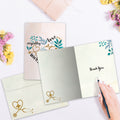Load image into Gallery viewer, The inside of Tree-Free’s Love and Empathy card, with the cover and envelope in the background.