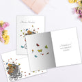 Load image into Gallery viewer, The inside of Tree-Free’s Felicidades Carriage card, with the cover and envelope in the background.