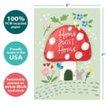 Load image into Gallery viewer, The cover of Tree-Free’s Mushroom House card with lines demonstrating its 5x7 dimensions, along with the following text: “100% PCW recycled paper, proudly made in the USA, sustainably printed on extra-thick card stock”