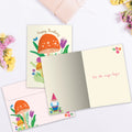 Load image into Gallery viewer, The inside of Tree-Free’s Grow Your Own Magic card, with the cover and envelope in the background.