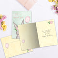 Load image into Gallery viewer, The inside of Tree-Free’s For a Special Girl card, with the cover and envelope in the background.