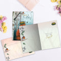 Load image into Gallery viewer, The inside of Tree-Free’s Like Royalty card, with the cover and envelope in the background.