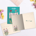 Load image into Gallery viewer, The inside of Tree-Free’s Adventures Begin card, with the cover and envelope in the background.
