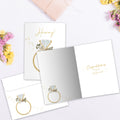 Load image into Gallery viewer, The inside of Tree-Free’s Hooray Ring card, with the cover and envelope in the background.