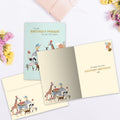 Load image into Gallery viewer, The inside of Tree-Free’s Parade on the Way card, with the cover and envelope in the background.
