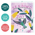 Load image into Gallery viewer, The cover of Tree-Free’s Sending Joy card with lines demonstrating its 5x7 dimensions, along with the following text: “100% PCW recycled paper, proudly made in the USA, sustainably printed on extra-thick card stock”