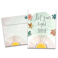Load image into Gallery viewer, The cover of Tree-Free's Let Your Light Shine card, along with its matching envelope.