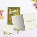 Load image into Gallery viewer, The inside of Tree-Free’s Home is Where card, with the cover and envelope in the background.