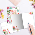 Load image into Gallery viewer, The inside of Tree-Free’s The Beauty of Wildflowers card, with the cover and envelope in the background.